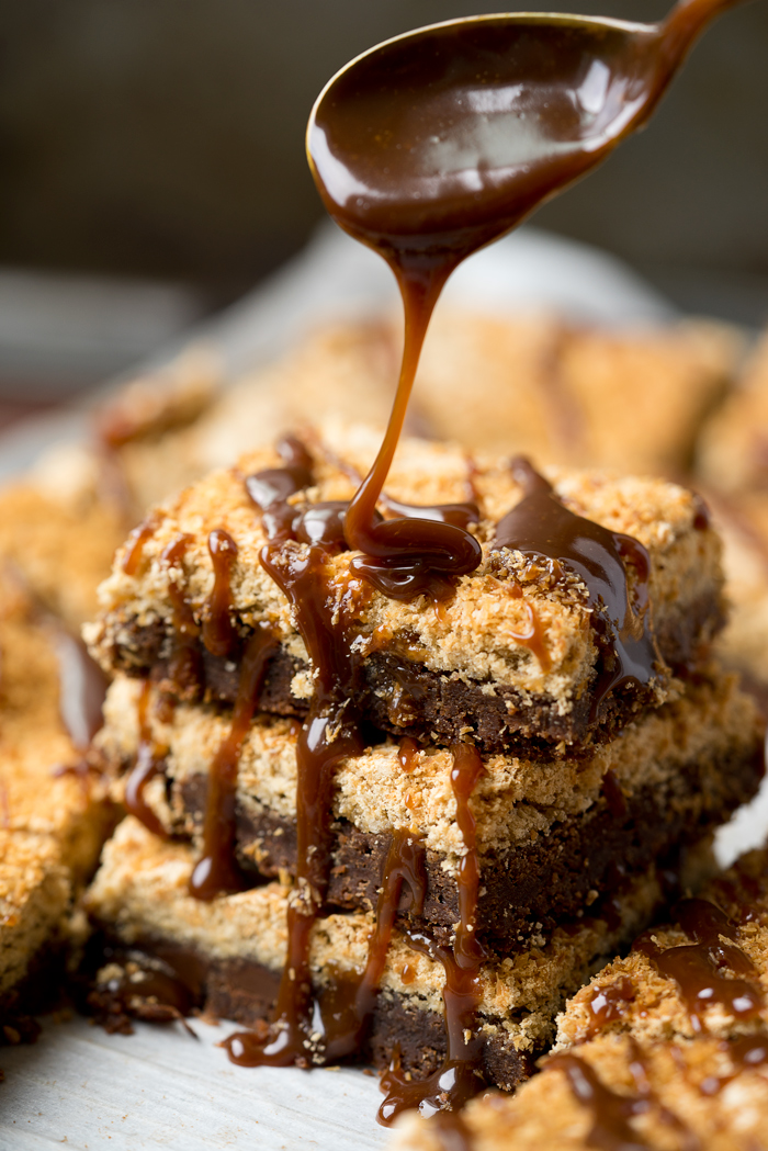 Dreamy Toasted Coconut Meringue Brownies! The only brownie recipe you need! Chocolatey, fudgey, chocolate chip studded brownie topped with a crisp, rich layer of brown sugar coconut meringue. 