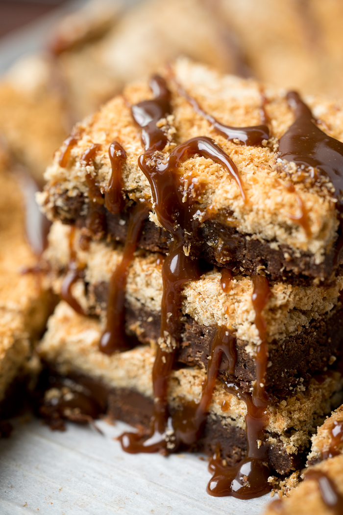 Dreamy Toasted Coconut Meringue Brownies! The only brownie recipe you need! Chocolatey, fudgey, chocolate chip studded brownie topped with a crisp, rich layer of brown sugar coconut meringue. 