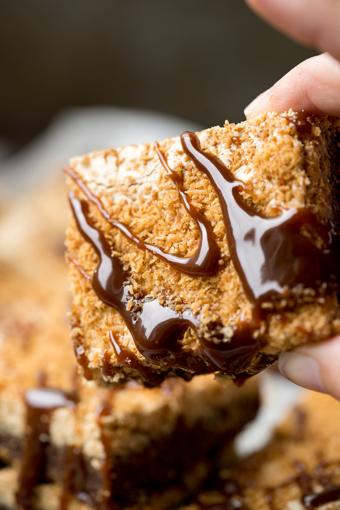 Dreamy Toasted Coconut Meringue Brownies! The only brownie recipe you need! Chocolatey, fudgey, chocolate chip studded brownie topped with a crisp, rich layer of brown sugar coconut meringue. 