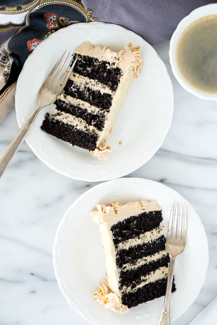 Black Cocoa Chocolate Espresso Cake. My new favorite cake recipe! Deep, dark, delicate crumbed chocolate cake enrobed in a blanket of rich, creamy espresso cream cheese frosting. | thesugarcoatedcottage.com