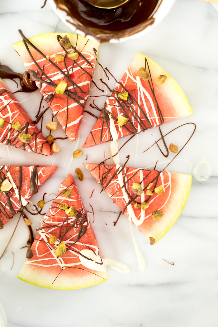 Chocolate Drizzled Pistachio Watermelon Wedges -Your easy and simple "How To" food guide to jazz up your watermelon wedges. We love a good healthy recipe for dessert! | thesugarcoatedcottage.com