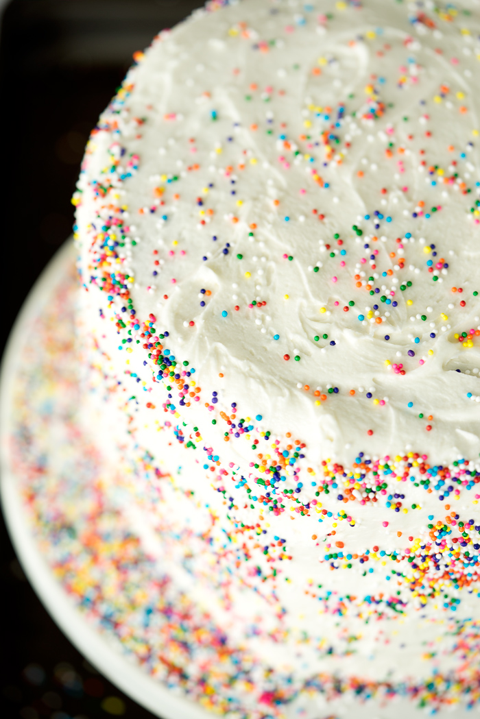 Super moist, buttery, yellow cake dotted with sprinkle. Classic, sweet and creamy buttercream frosting sprinkled with...well sprinkles. 