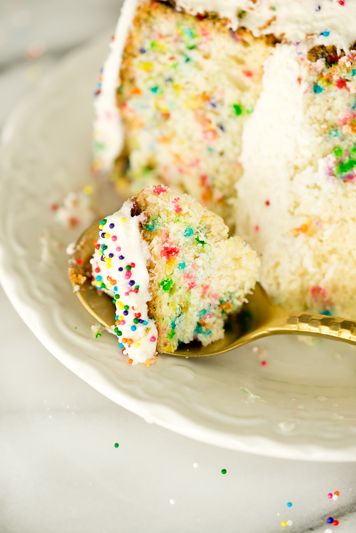Super moist, buttery, yellow cake dotted with sprinkle. Classic, sweet and creamy buttercream frosting sprinkled with...well sprinkles. 