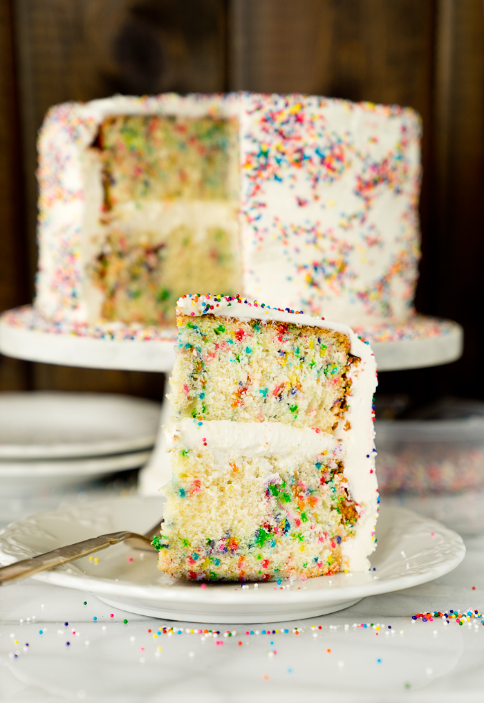 Super moist, buttery, yellow cake dotted with sprinkle. Classic, sweet and creamy buttercream frosting sprinkled with...well sprinkles. 