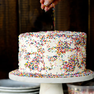 Super moist, buttery, yellow cake dotted with sprinkle. Classic, sweet and creamy buttercream frosting sprinkled with...well sprinkles.