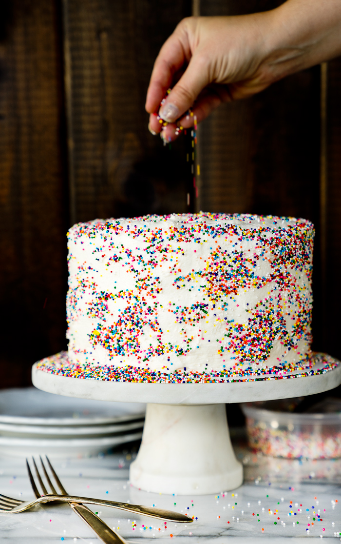 Super moist, buttery, yellow cake dotted with sprinkle. Classic, sweet and creamy buttercream frosting sprinkled with...well sprinkles. 