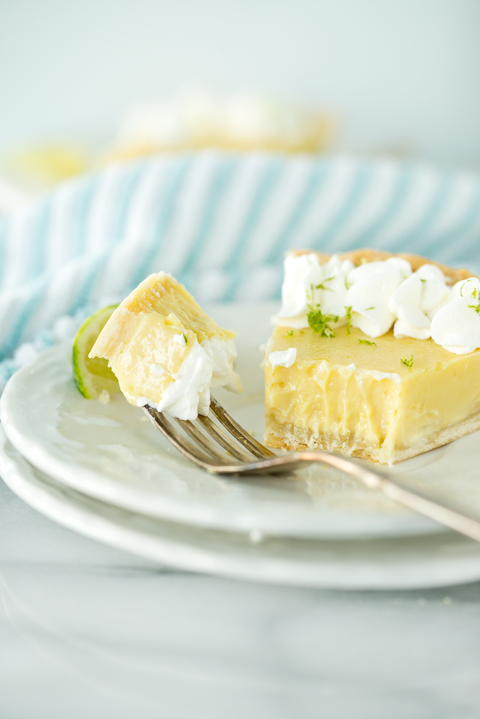 Classic Key Lime Pie recipe! Sweet, tart, puckery goodness. | thesugarcoatedcottage.com