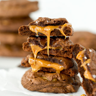 Dark Chocolate Caramel Stuffed Cookies. The best cookie recipe ever! Deep, dark chocolate. Gooey caramel and a sprinkling of flaky sea salt. | thesugarcoatedcottage.com