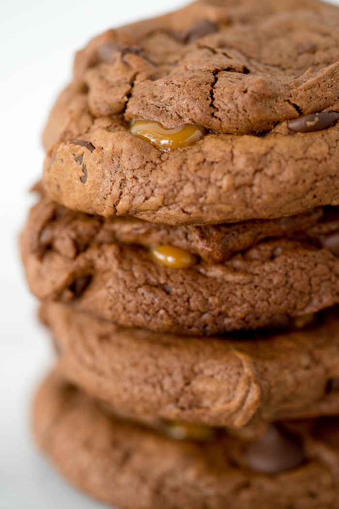 Dark Chocolate Caramel Stuffed Cookies. The best cookie recipe ever! Deep, dark chocolate. Gooey caramel and a sprinkling of flaky sea salt. | thesugarcoatedcottage.com