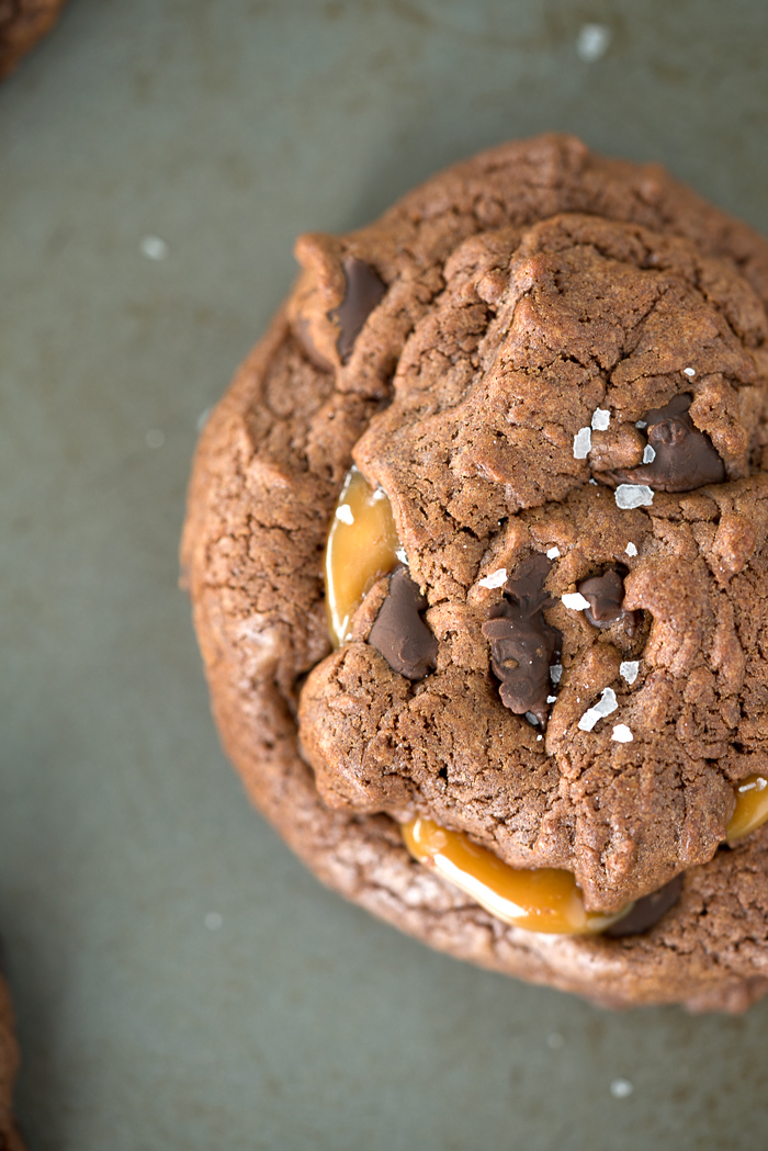 Dark Chocolate Caramel Stuffed Cookies. The best cookie recipe ever! Deep, dark chocolate. Gooey caramel and a sprinkling of flaky sea salt. | thesugarcoatedcottage.com