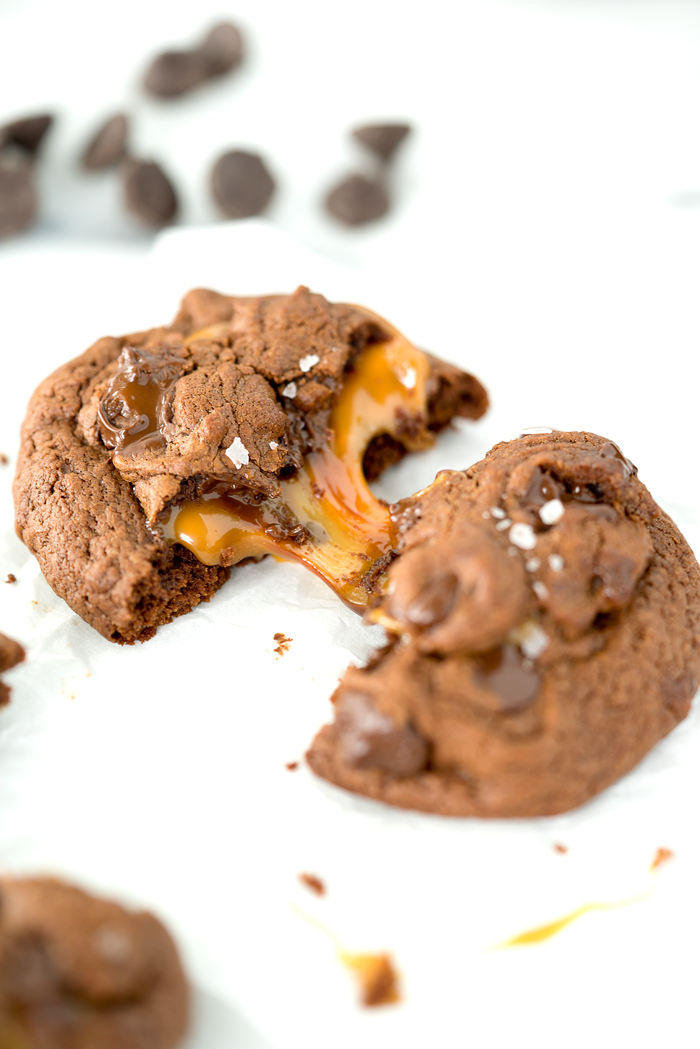 Dark Chocolate Caramel Stuffed Cookies. The best cookie recipe ever! Deep, dark chocolate. Gooey caramel and a sprinkling of flaky sea salt. | thesugarcoatedcottage.com