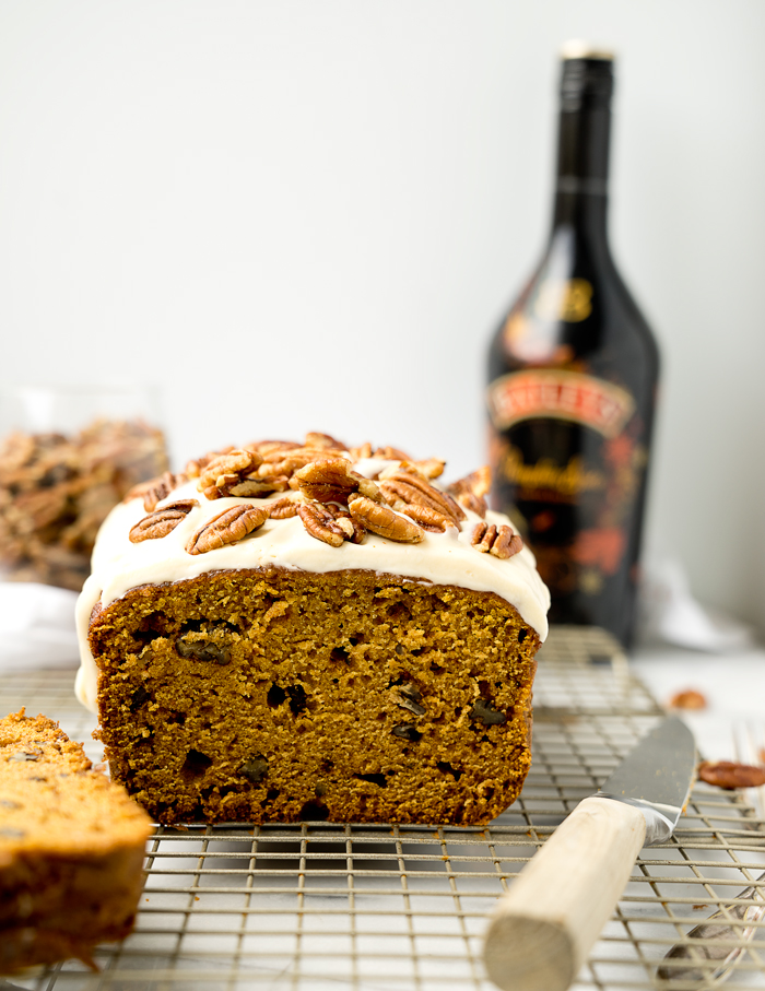 Pecan Pumpkin Bread with Pumpkin Spice Cream Cheese Glaze. The best pumpkin bread recipe and glaze you'll ever eat. | thesugarcoatedcottage.com