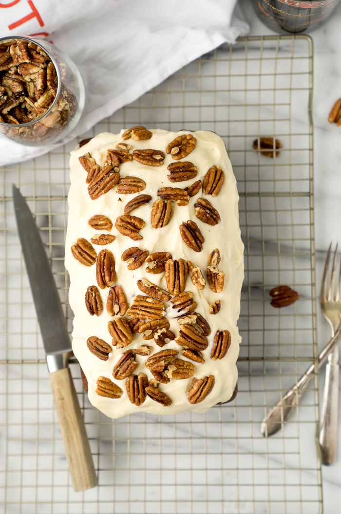 Pecan Pumpkin Bread with Pumpkin Spice Cream Cheese Glaze. The best pumpkin bread recipe and glaze you'll ever eat. | thesugarcoatedcottage.com