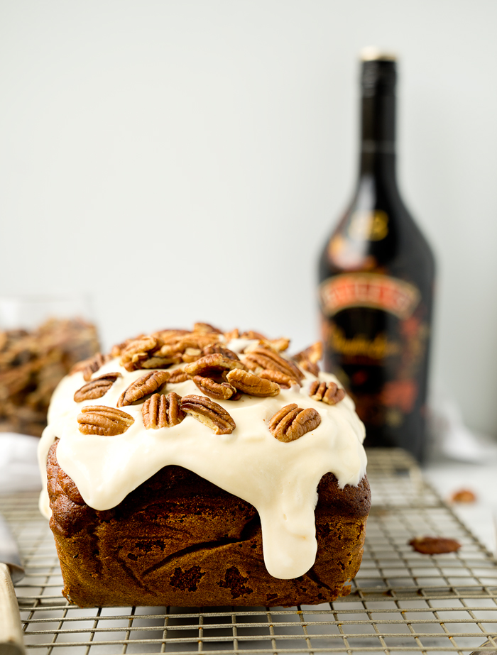 Pecan Pumpkin Bread with Pumpkin Spice Cream Cheese Glaze. The best pumpkin bread recipe and glaze you'll ever eat. | thesugarcoatedcottage.com