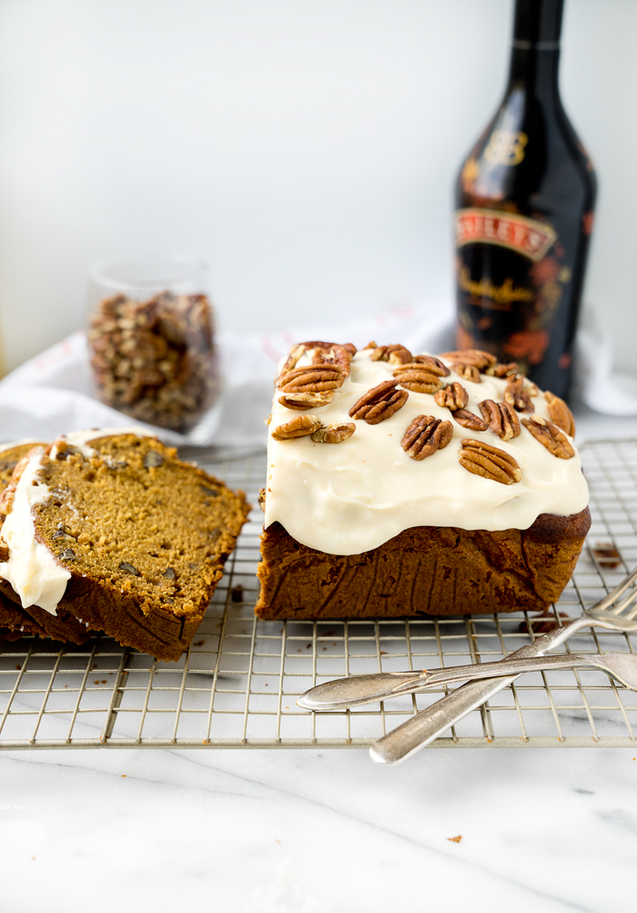 Pecan Pumpkin Bread with Pumpkin Spice Cream Cheese Glaze. The best pumpkin bread recipe and glaze you'll ever eat. | thesugarcoatedcottage.com