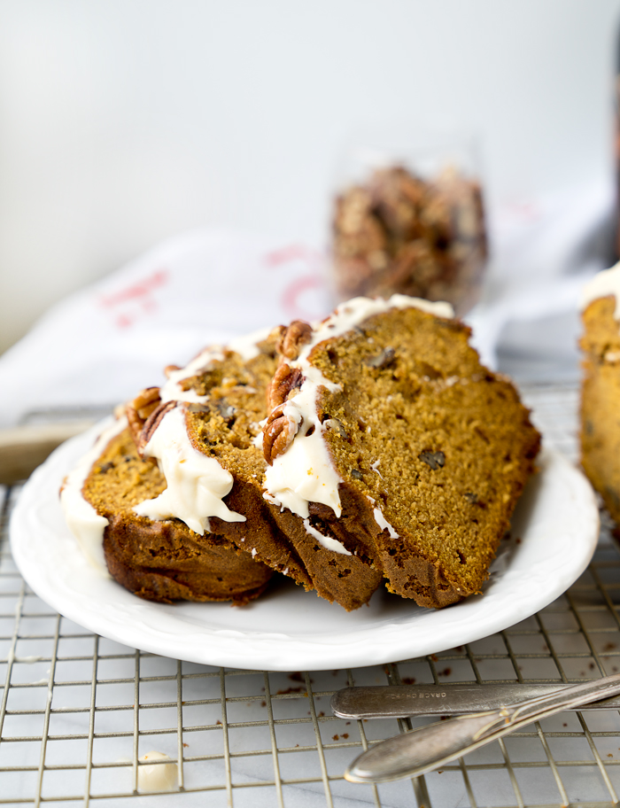 Pecan Pumpkin Bread with Pumpkin Spice Cream Cheese Glaze. The best pumpkin bread recipe and glaze you'll ever eat. | thesugarcoatedcottage.com