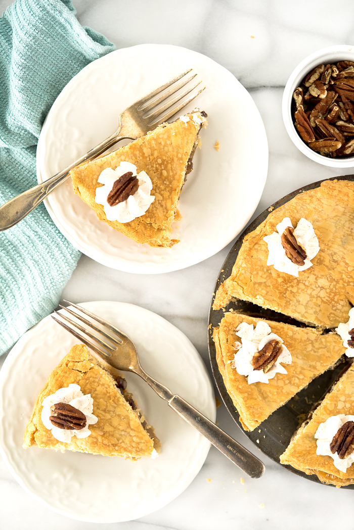 Simple Maple Pecan Pie with Cinnamon Whipped Cream. A traditional yet simple pie for any gathering. | thesugarcoatedcottage.com