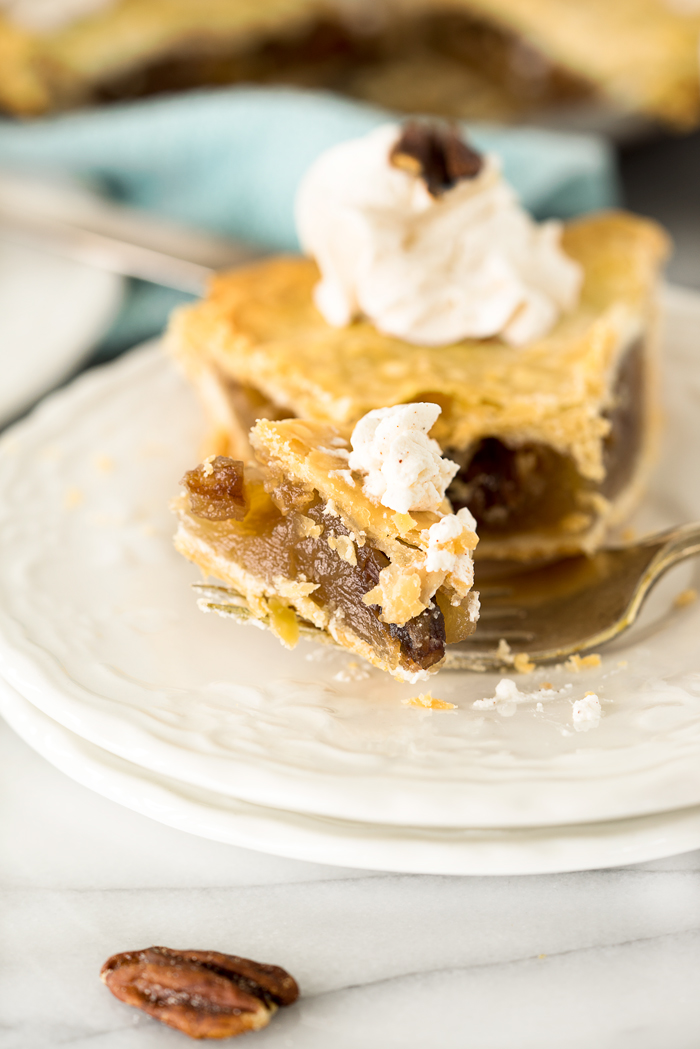 Simple Maple Pecan Pie with Cinnamon Whipped Cream. A traditional yet simple pie for any gathering. | thesugarcoatedcottage.com