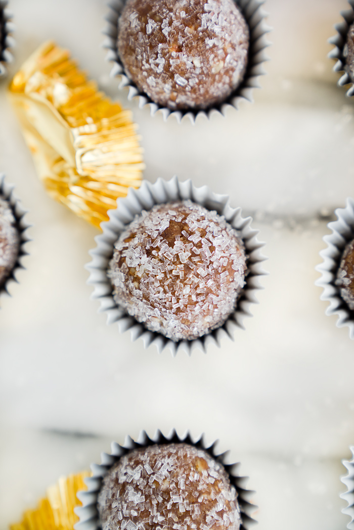 Brandy Pecan Ball Recipe. Need an awesome cookie to take to your next holiday gathering or maybe a cookie to snack on as the snow falls and you cuddle by the fireplace? Brandy Pecan Balls are the answer. | thesugarcoatedcottage.com