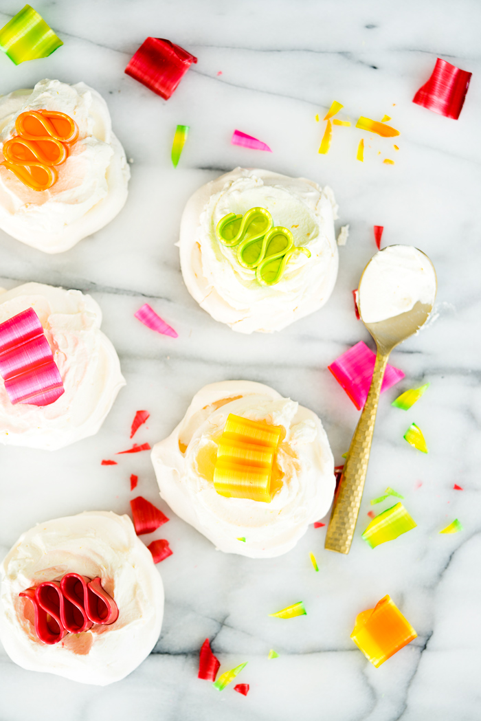 Orange Scented Mini Pavlovas recipe. Crispy, chewy meringues with a dollop of orange scented whipped cream! | thesugarcoatedcottage.com