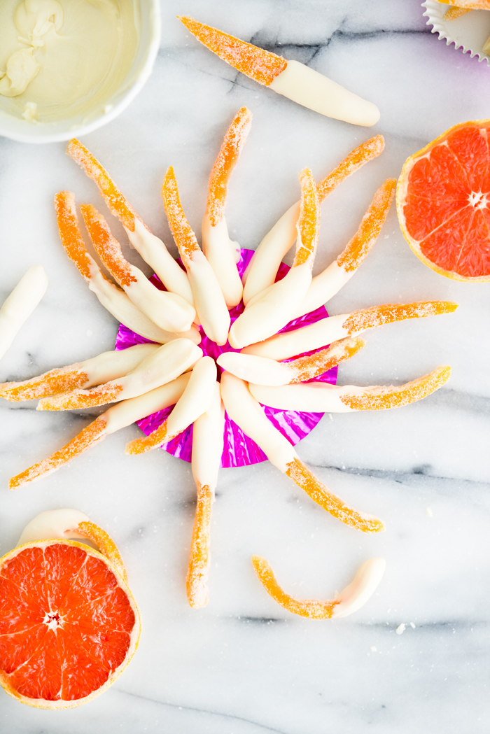 White Chocolate Covered Candied Grapefruit Peel Recipe. Bitter sweet grapefruit peel candied to perfection and dipped in sweet, creamy white chocolate. 3 ingredient, no bake, candy. | thesugarcoatedcottage.com