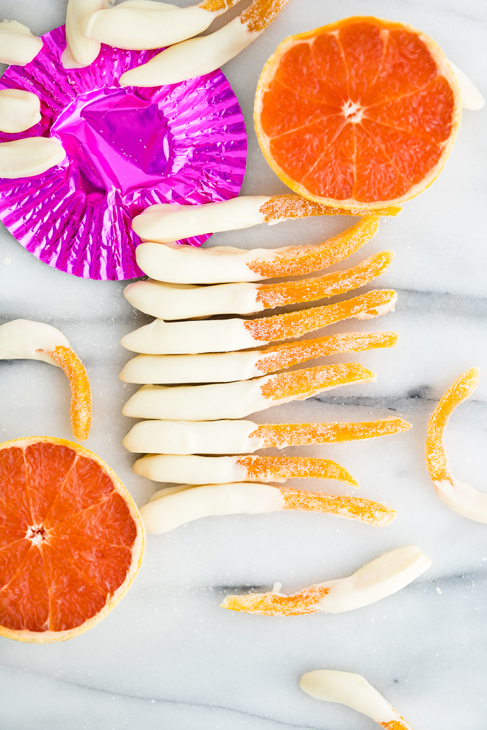 White Chocolate Covered Candied Grapefruit Peel Recipe. Bitter sweet grapefruit peel candied to perfection and dipped in sweet, creamy white chocolate. 3 ingredient, no bake, candy. | thesugarcoatedcottage.com
