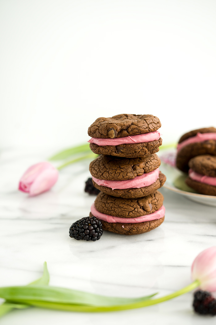 Blackberry Buttercream Double Chocolate Sandwich Cookie Recipe. Sweet blackberry buttercream sandwiched between two double chocolate cookies. #cookies #buttercream #recipe #blackberry | thesugarcoatedcottage.com