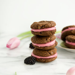 Blackberry Buttercream Double Chocolate Sandwich Cookie Recipe. Sweet blackberry buttercream sandwiched between two double chocolate cookies. #cookies #buttercream #recipe #blackberry | thesugarcoatedcottage.com