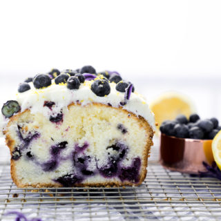 Cream Cheese Lemon Blueberry Pound Cake Recipe. Moist and creamy lemony pound cake studded with sweet plump blueberries. There is nothing like a great pound cake! | thesugarcoatedcottage.com #lemon #recipe #blueberry #cake #poundcake