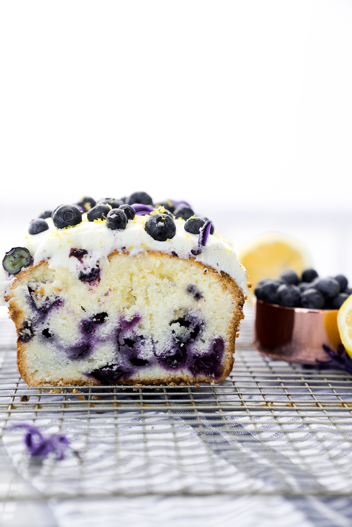 Cream Cheese Lemon Blueberry Pound Cake Recipe. Moist and creamy lemony pound cake studded with sweet plump blueberries. There is nothing like a great pound cake! | thesugarcoatedcottage.com #lemon #recipe #blueberry #cake #poundcake