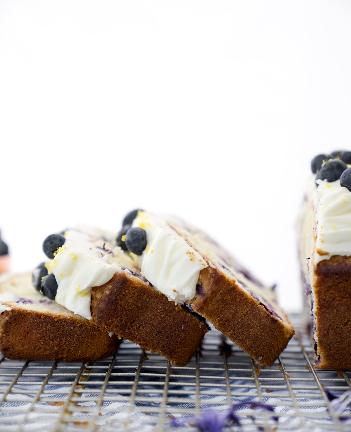 Cream Cheese Lemon Blueberry Pound Cake Recipe. Moist and creamy lemony pound cake studded with sweet plump blueberries. There is nothing like a great pound cake! | thesugarcoatedcottage.com #lemon #recipe #blueberry #cake #poundcake