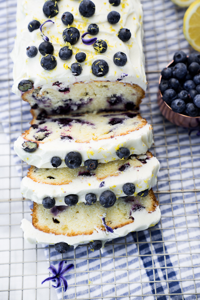Cream Cheese Lemon Blueberry Pound Cake Recipe. Moist and creamy lemony pound cake studded with sweet plump blueberries. There is nothing like a great pound cake! | thesugarcoatedcottage.com #lemon #recipe #blueberry #cake #poundcake
