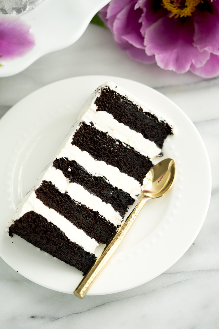 Deep Dark Chocolate 5 Layer Cake Recipe. The absolute best chocolate cake ever! #cake #chocolatecake #chocolate #cakerecipe #recipe | thesugarcoatedcottage.com