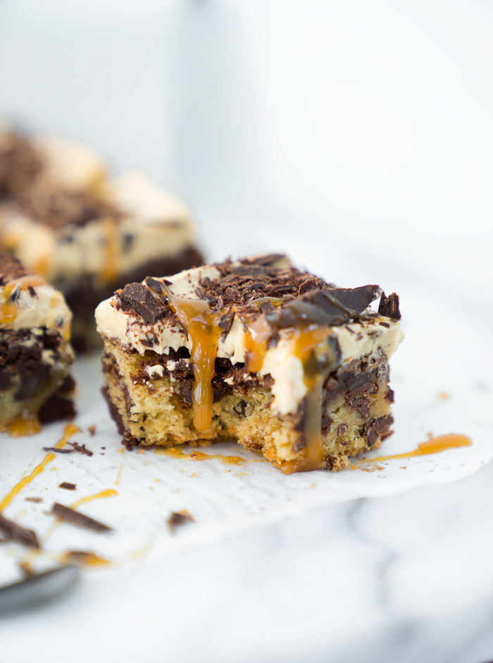 THE BEST BROOKIES ever! Half brownie, half chocolate chip cookie, whipped peanut butter frosting! | thesugarcoatedcottage.com | #brookies #brownies #peanut