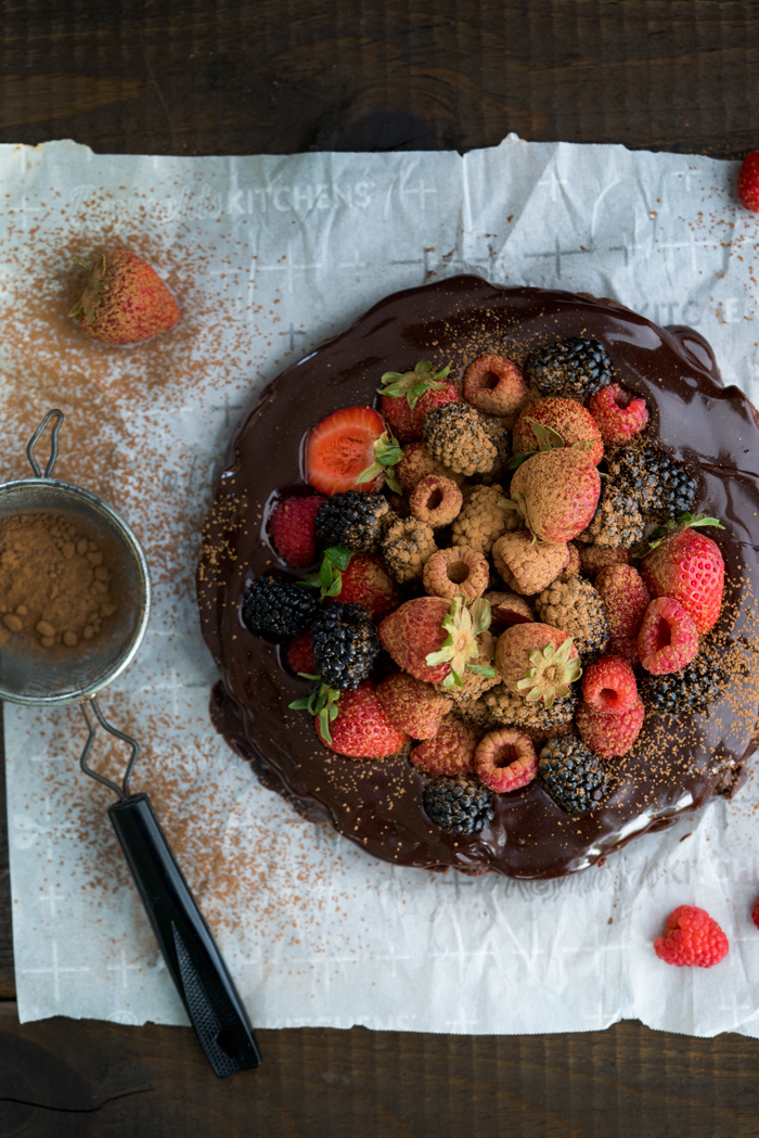 Fudgy Ganache Brownie Cake. Rich fudgy brownie slathered in creamy ganache and topped with fresh berries. | thesugarcoatedcottage.com #brownies #cake