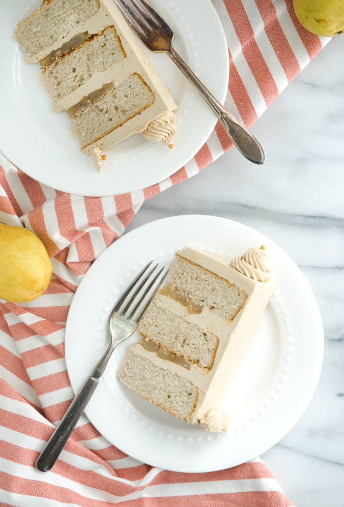 Pear Spice Cake with Dark Brown Sugar Buttercream. Layers of spice cake, caramelized pears and dark brown sugar buttercream. | thesugarcoatedcottage.com