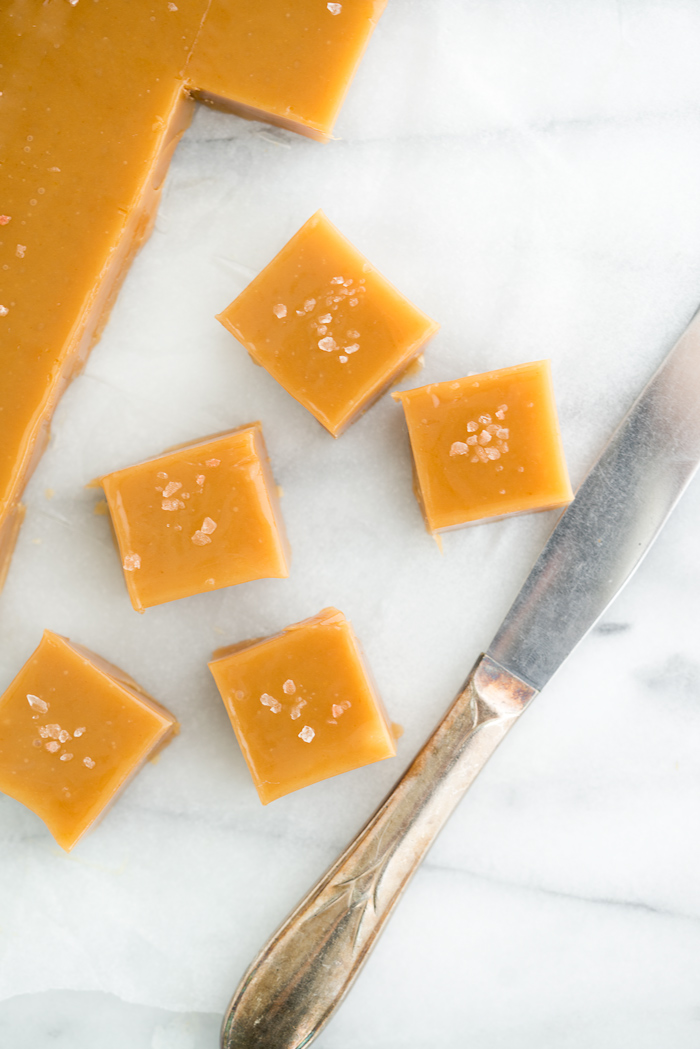 Salted Kentucky Bourbon Caramels. Sticky, gooey, bourbon enhanced caramel candy. An addicting candy classic. | thesugarcoatedcottage.com #caramel #candy