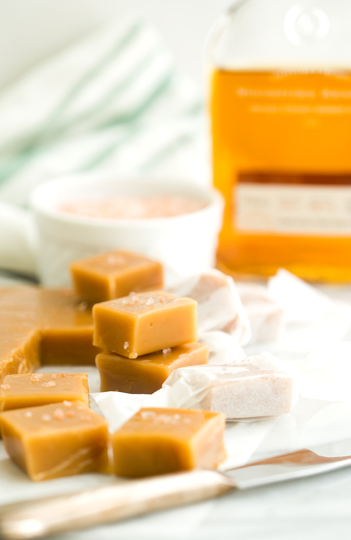 Salted Kentucky Bourbon Caramels. Sticky, gooey, bourbon enhanced caramel candy. An addicting candy classic. | thesugarcoatedcottage.com #caramel #candy