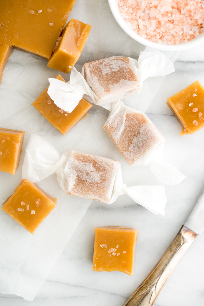 Salted Kentucky Bourbon Caramels. Sticky, gooey, bourbon enhanced caramel candy. An addicting candy classic. | thesugarcoatedcottage.com #caramel #candy