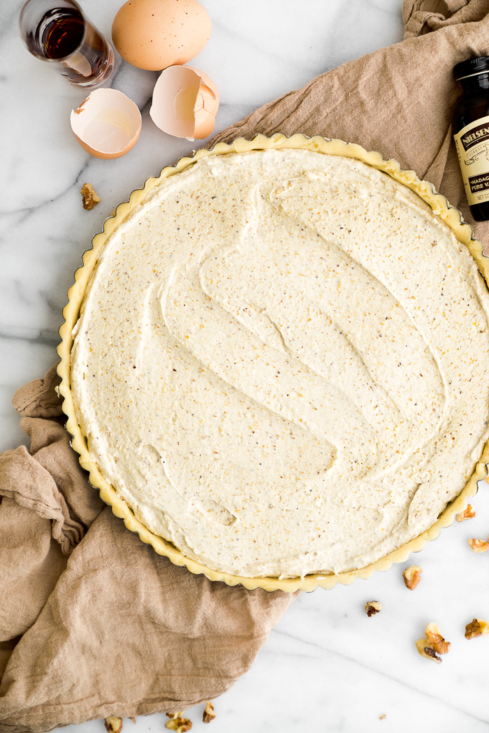 Walnut Rum Tart. Walnuts, salted caramel and rum all wrapped in a buttery crust. The filling is soft, delicate and crumbly. | thesugarcoatedcottage.com