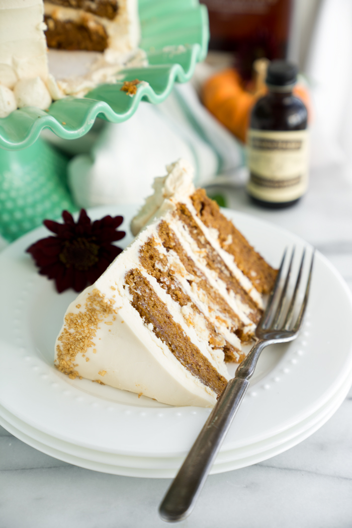 Pumpkin Cake with Salted Caramel Bourbon Buttercream. The only dessert you'll ever need this Thanksgiving. Perfectly spiced, unbelievable texture. | thesugarcoatedcottage.com