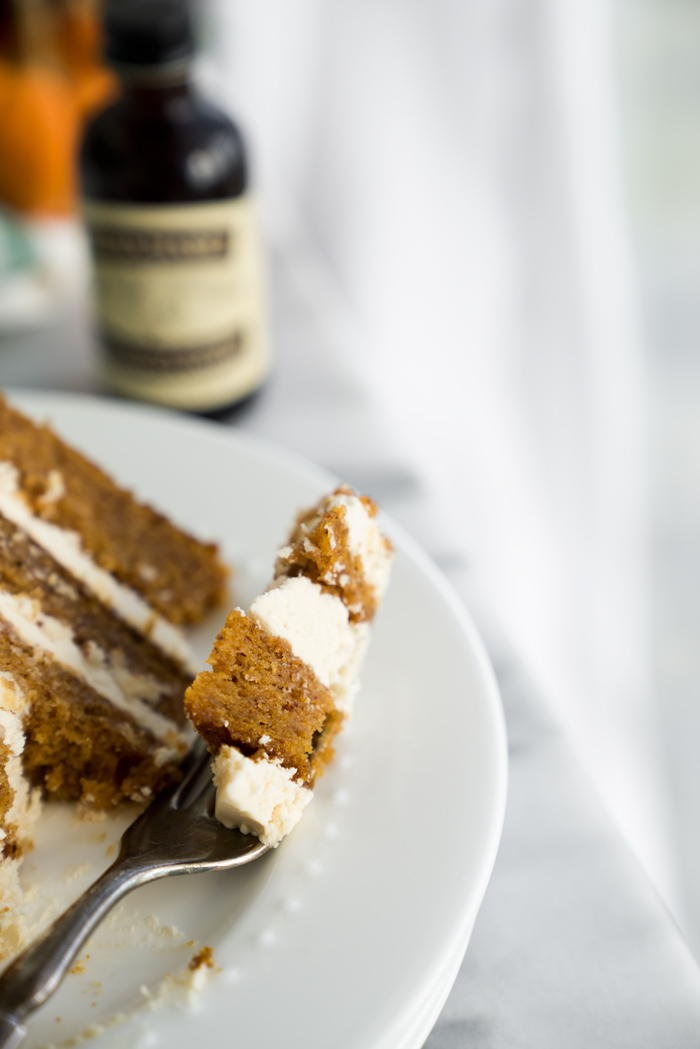 Pumpkin Cake with Salted Caramel Bourbon Buttercream. The only dessert you'll ever need this Thanksgiving. Perfectly spiced, unbelievable texture. | thesugarcoatedcottage.com