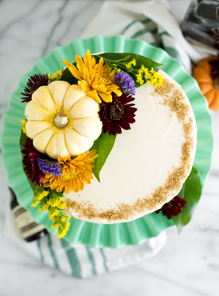 Pumpkin Cake with Salted Caramel Bourbon Buttercream. The only dessert you'll ever need this Thanksgiving. Perfectly spiced, unbelievable texture. | thesugarcoatedcottage.com