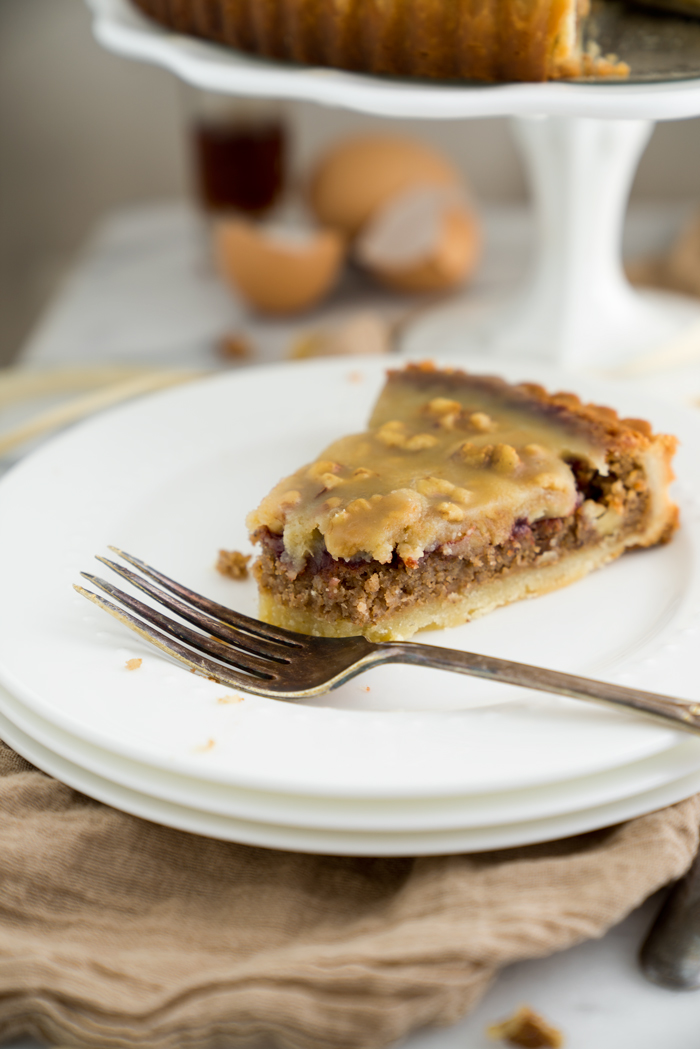 Walnut Rum Tart. Walnuts, salted caramel and rum all wrapped in a buttery crust. The filling is soft, delicate and crumbly. | thesugarcoatedcottage.com