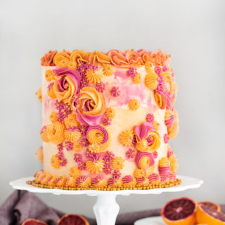 Blood Orange Cake. Blood orange scented cake layered with fresh blood orange curd. | thesugarcoatedcottage.com #bloodorange #orangecurd #cake #buttercream