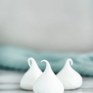 Meringue Kisses Recipe. The perfect dollop of meringue baked into a crispy on the outside, chewy on the inside cookie. | thesugarcoatedcottage.com #merignue