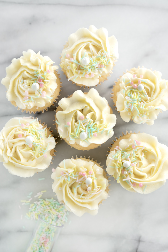 The best vanilla cupcake recipe. Sweet, buttery and full of vanilla flavor. | thesugarcoatedcottage.com #cupcakes #buttercream #vanillacupcake #cake #recipe