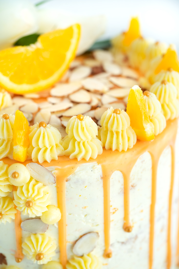 Vanilla Orange Almond Cake Recipe. Vanilla orange and almond soaked cake with layers of vanilla orange almond buttercream. | thesugarcoatedcottage.com #cake 