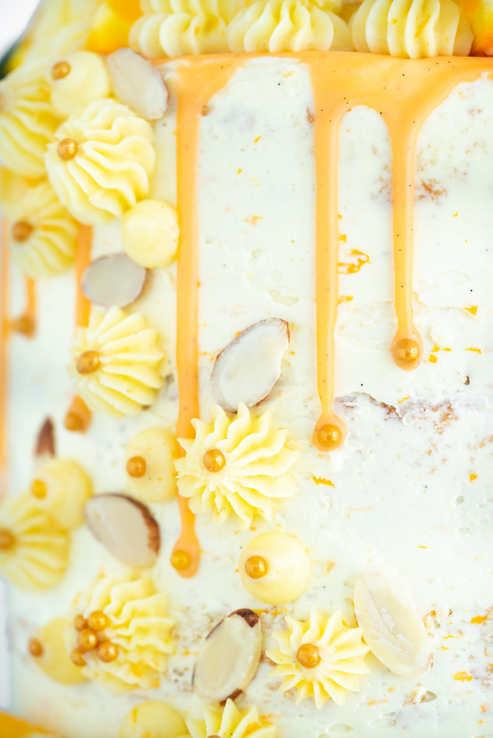 Vanilla Orange Almond Cake Recipe. Vanilla orange and almond soaked cake with layers of vanilla orange almond buttercream. | thesugarcoatedcottage.com #cake 