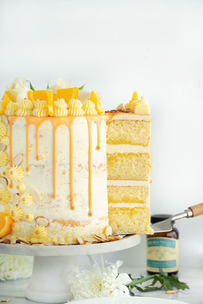Vanilla Orange Almond Cake Recipe. Vanilla orange and almond soaked cake with layers of vanilla orange almond buttercream. | thesugarcoatedcottage.com #cake 